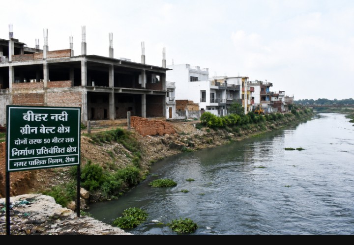Rewa News:बीहर नदी के ग्रीन बेल्ट में धड़ल्ले से निर्माण, MIC सदस्य धनेन्द्र सिंह बघेल ने की कलेक्टर से कार्रवाई की मांग